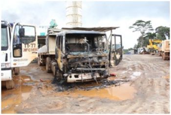 A truck burned at Tokadeh protesting youths block access to AMLs mine site